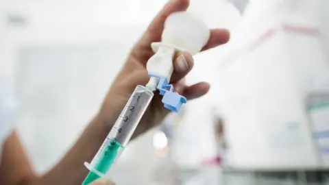 Fotogloria A syringe