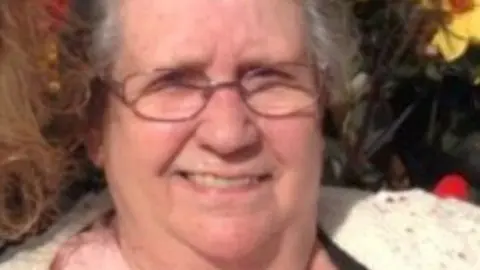 Woodier family/SWNS Joan Woodier