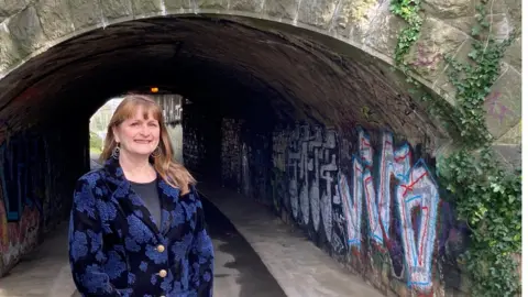 Plymouth City Council A photo of Maddi Bridgeman outside Richmond Walk Tunnel