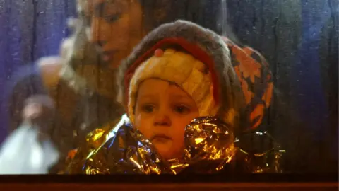 Reuters A Ukrainian child refugee