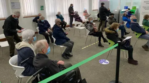 People at Robertson House, Stevenage, waiting for their vaccine