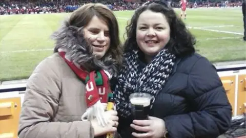 Ffion Miles Ffion and her friend at a Wales game