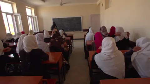 Girls pictured in a classroom in a Taliban-controlled area