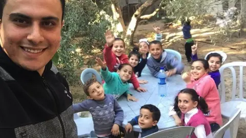 Ahmed al-Naouq A selfie of the al-Naouq children and their uncle Ahmed