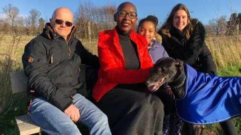 BBC Dennis, Lilli and Melody Barnes with their au pair Pauline