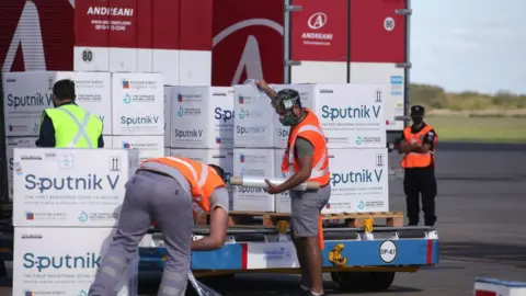 Getty Images Cases of Sputnik V vaccine arrive in Argentian
