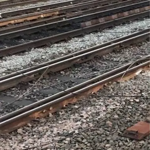 Network Rail Damaged cables lay across railway track in Wembley