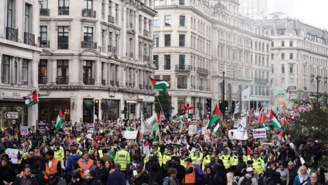 Man charged over racist comments at pro-Palestine rally