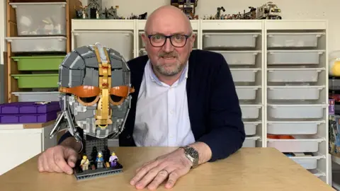 Andrew Webb Andrew Webb with his Lego helmet