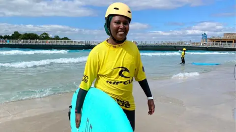 BBC Wafa suliman (former Sudanese swim champ) taking part in Open Minds Active project - encouraging women of colour to swim