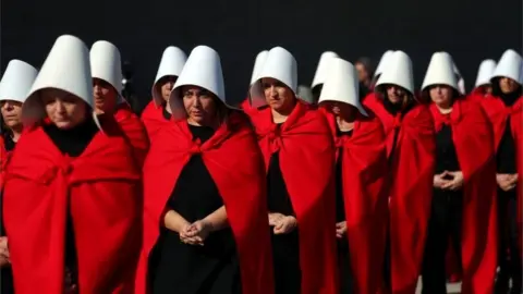 Reuters Activists dressed up as characters from "The Handmaid's Tale" take part in a demonstration in favour of legalising abortion in Buenos Aires, Argentina, August 5, 2018