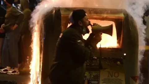 EPA Clashes during protests in Naples against coronavirus restrictions, 23 October 2020