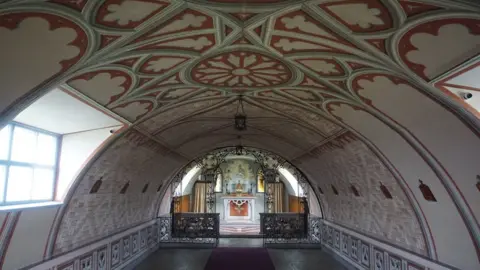Dr Sarah Christie Visiting the POW Italian Chapel on Lambholm (Orkney), the ceiling and the perspective of the converted Nissen hut caught my eye. Sarah Christie, Aberdeen