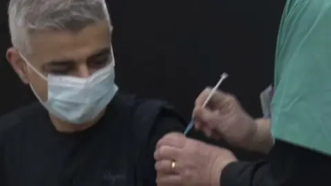 Sadiq Khan receives first jab