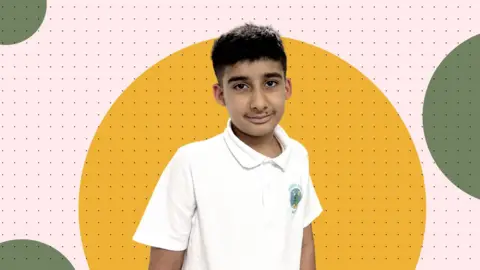 Arav a 12 year old boy smiles at the camera while wearing a school uniform polo shirt