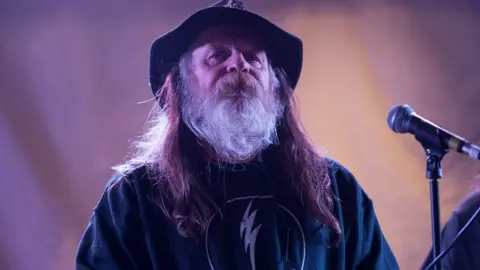 Peter Stanley Stephen Smith performing