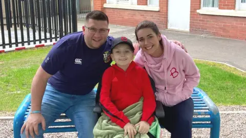 Watson family Sara and David Watson with their late son Adam, who died in August 2022