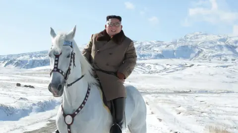 AFP North Korean leader Kim Jong Un riding a white horse amongst the first snow at Mouth Paektu.