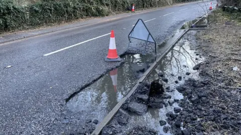 BBC The council have reminded motorists to take 'extra care' when driving on flooded roads