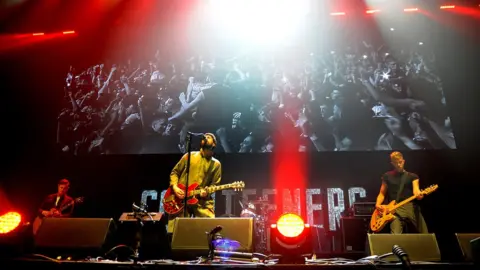 Getty Images The Courteeners help to re-open the Manchester Arena with the We Are Manchester benefit gig in 2017