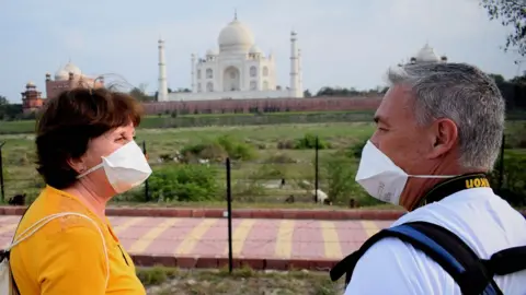 Anadolu Agency A couple in front of the Taj Mahal