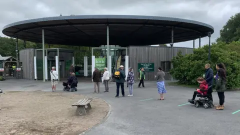 Visitors queue for the National Botanic Garden of Wales