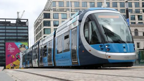 PA Media A tram in Birmingham