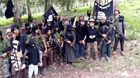 Abu Sayyaf Video screengrab shows a number of jihadist groups pledging allegiance to the so-called Islamic State group