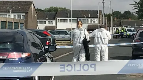 Forensic officers on Valley Road, Park Village
