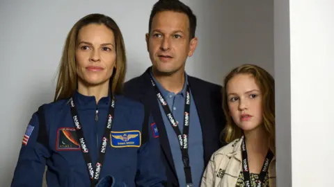 Netflix Hilary Swank, Josh Charles and Talitha Bateman in Away