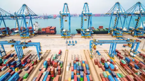 Getty Images An aerial view of a port in Qingdao in China's eastern Shandong province on March 8, 2019