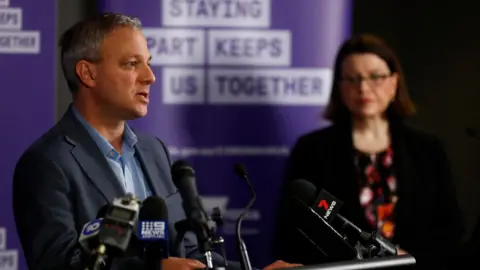 Getty Images Victoria's health officer Professor Brett Sutton and Health Minister Jenny Mikakos give a press briefing