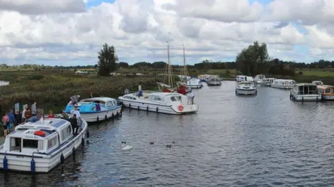 Oast House Archive/Geograph Boats moored and sailing along the River Ant by Ludham Bridge