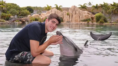 Getty Images SeaWorld worker with fish