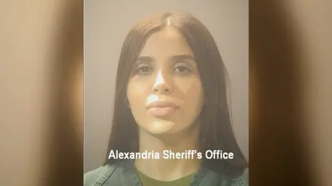 Alexandria Sheriff’s Office via Getty Images Emma Coronel Aispuro,poses for a mug shot