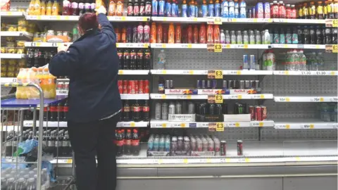 Getty Images A shop worker