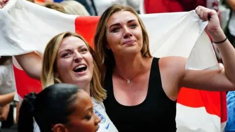 PA Media England fans crying while watching the World Cup semi-final