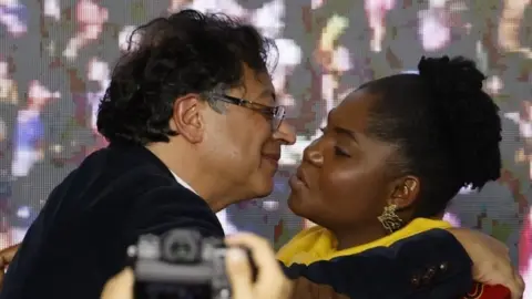 EPA Colombian presidential candidate Gustavo Petro (L) celebrates with his vice-presidential candidate Francia Marquez (R), at the end of the election day, in Bogota, Colombia, 29 May 2022.