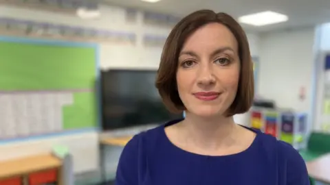 Simon Dedman Bridget Phillipson in a class room