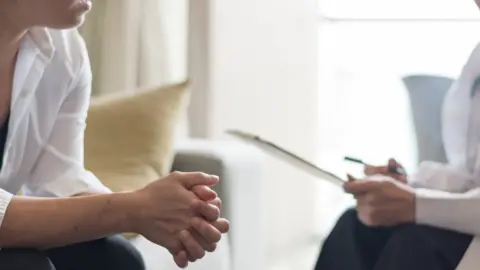 Getty Images Doctor and patient in discussion