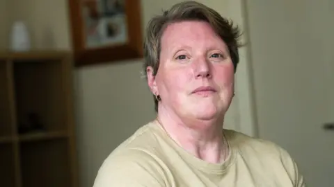 BBC News  Liz Andrews, pictured in her home in Glasgow