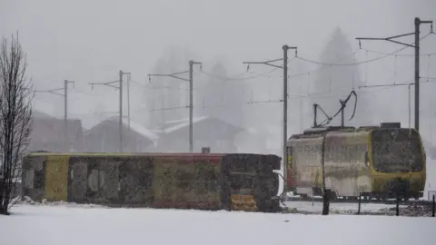 EPA Derailed train near Lenk, in Switzerland, on 3 January 2018