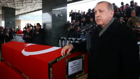 Reuters Turkish President Recep Tayyip Erdogan attends the funeral of Musa Ozalka, a soldier killed in the Afrin operation (23 January 2018)