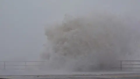 Rose Voon A wave crashes on to the front at Aberystwyth