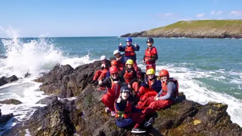 IOL Children on rock