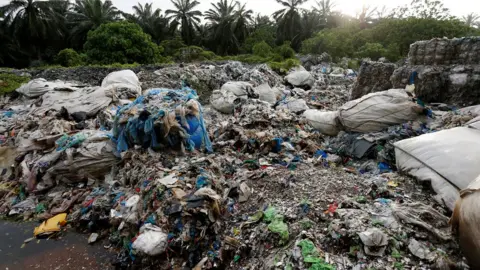 Reuters Waste at an illegal plastic recycling factory in Malaysia