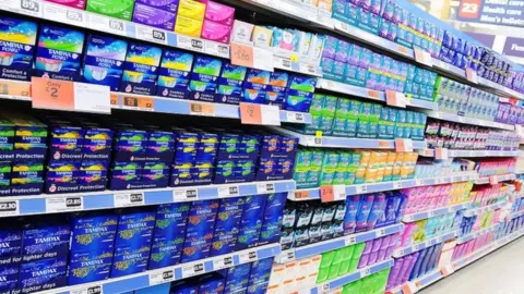 Alamy Sanitary products in supermarket