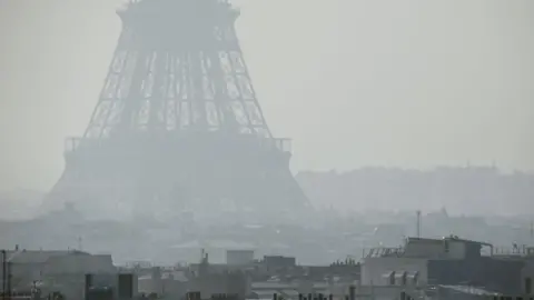 Getty Images File pic of Eiffel Tower in thick smog in 2014