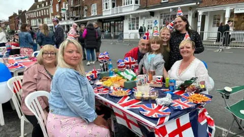 BBC A family celebrating in Marlborough