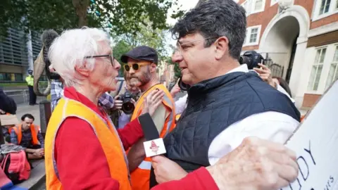 PA Media Judy Bruce protest outside the Home Office in central London on 22 September
